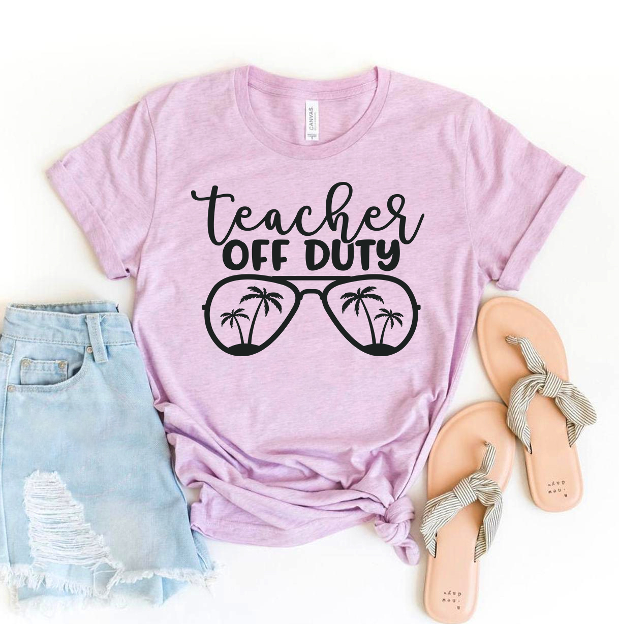 Teacher Off Duty T-shirt made of premium ring spun cotton, featuring a stylish design with soft textile flex print.