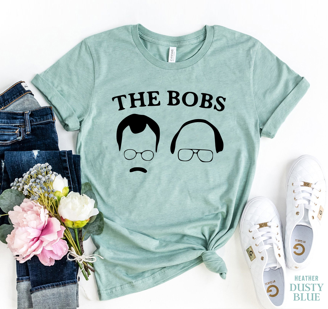 The Bobs T-shirt in various sizes, showcasing its premium quality fabric and vibrant print.