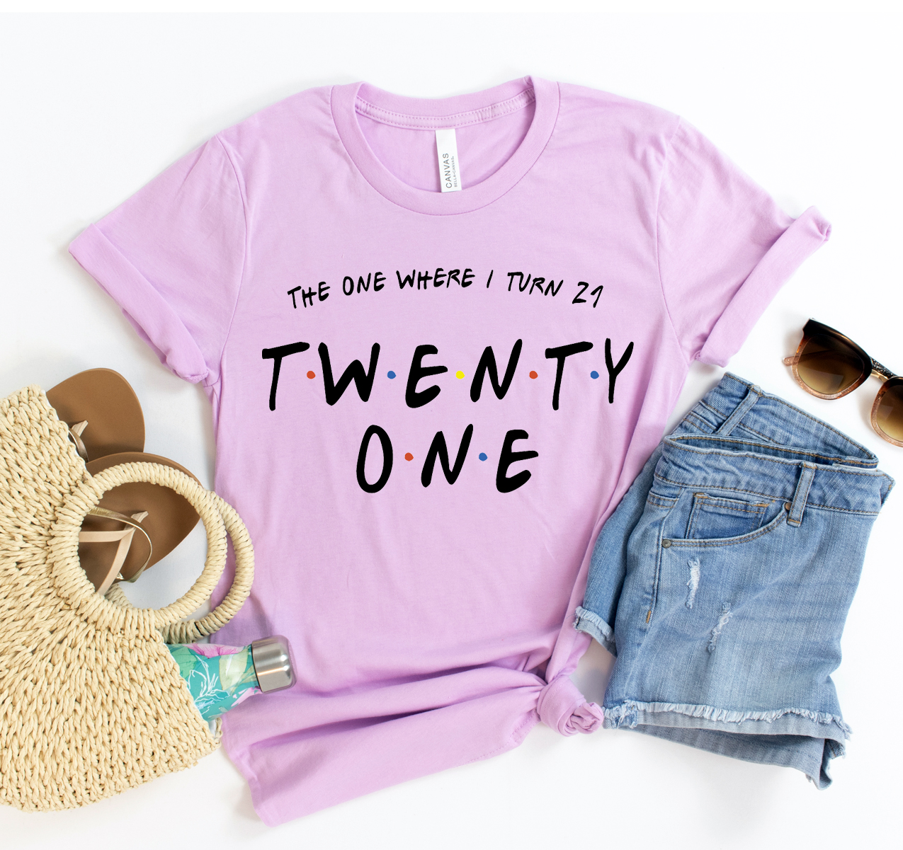 A stylish unisex T-shirt with the phrase 'The One Where I Turn Twenty One' printed on it, made from soft cotton fabric.