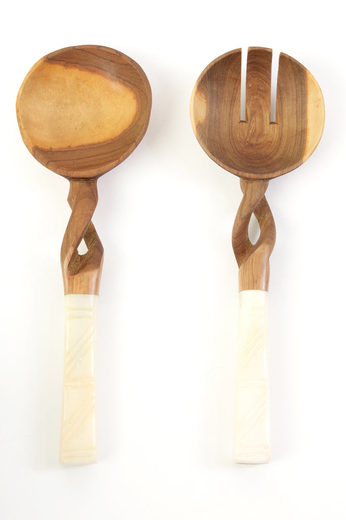 Twisted Olivewood Servers with polished cow bone handles, showcasing unique African line art etchings.