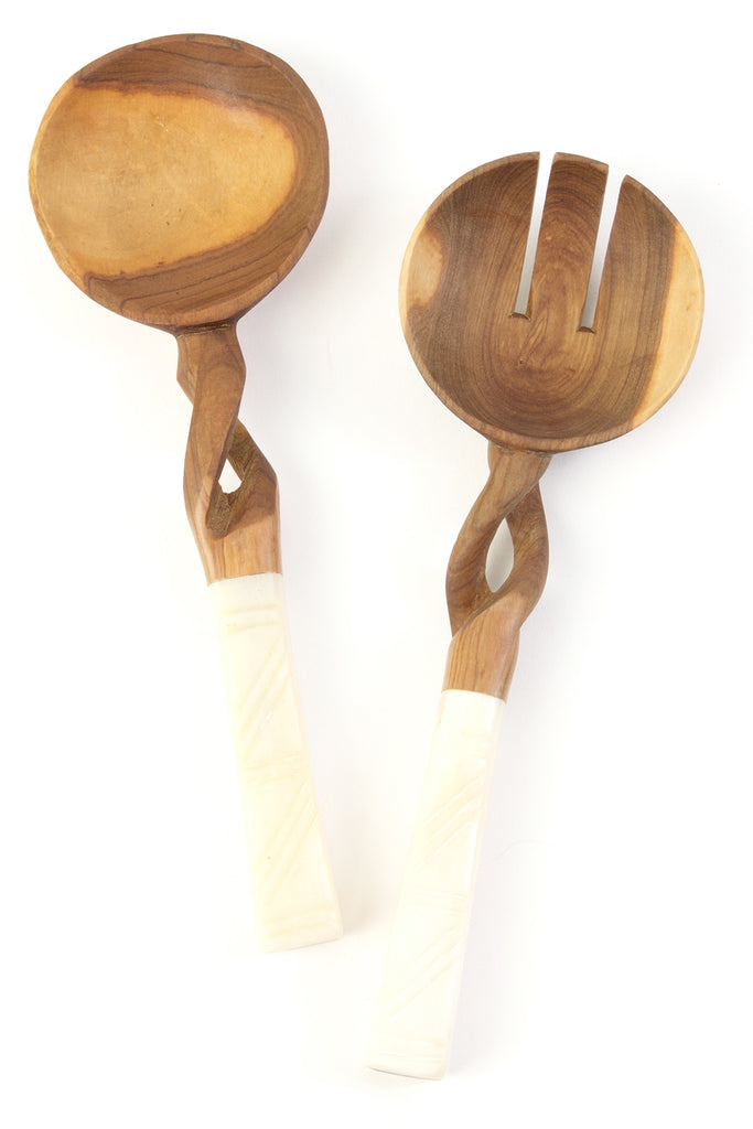 Twisted Olivewood Servers with polished cow bone handles, showcasing unique African line art etchings.