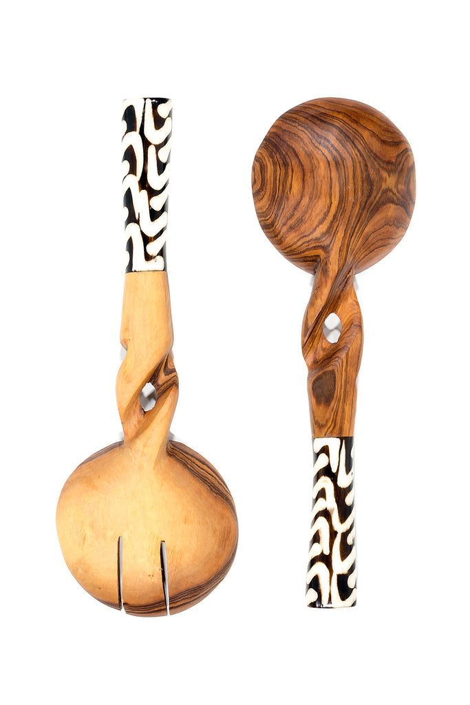 Handcrafted Twisted Olivewood Servers with unique bone handles, showcasing intricate grain patterns and a smooth finish.