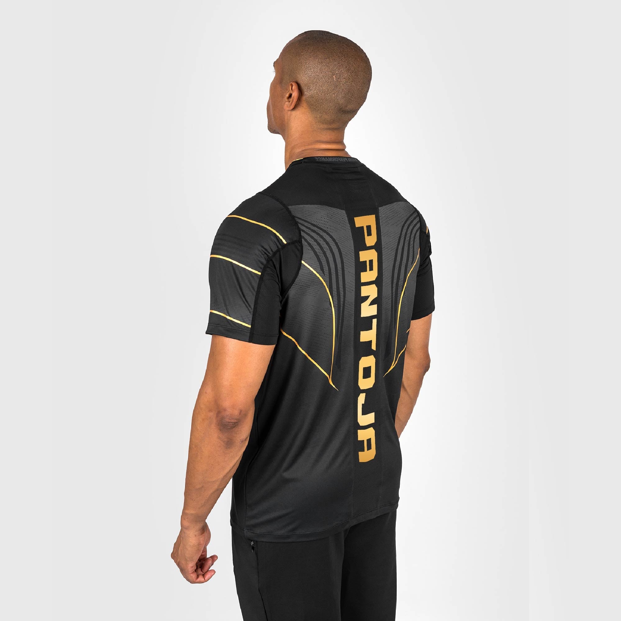 UFC VENUM Alexandre Pantoja Authentic Fight Night 2.0 Men’s Walkout jersey featuring a retro-style collar and sublimated graphics.