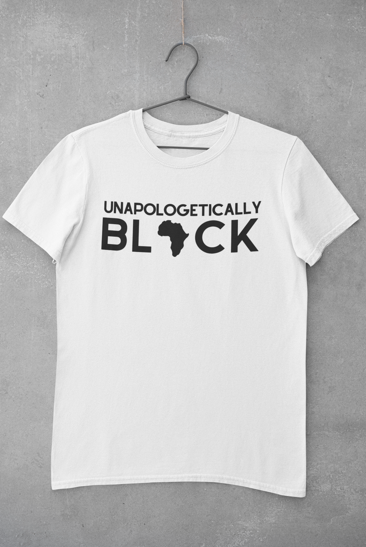 Unapologetically Black Shirt displayed on a hanger, showcasing its vibrant design and quality fabric.