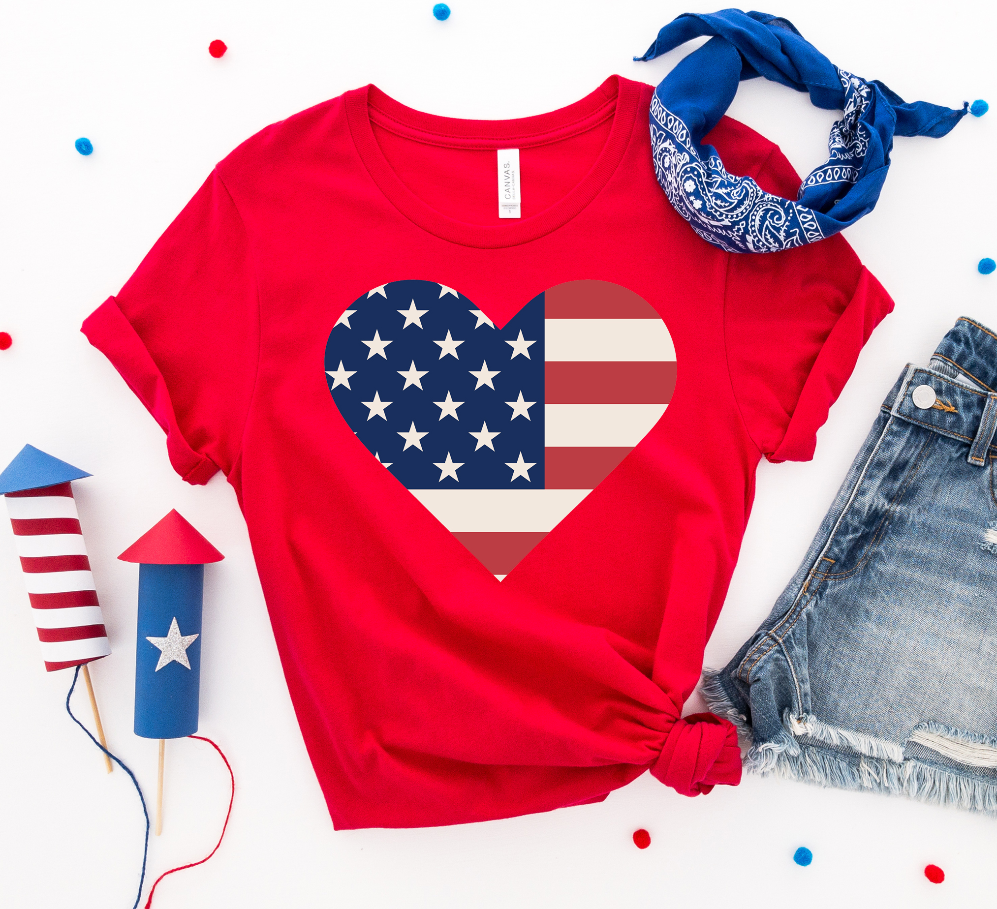 USA Flag Heart T-shirt made of premium ring spun cotton with a vibrant heart-shaped flag design.