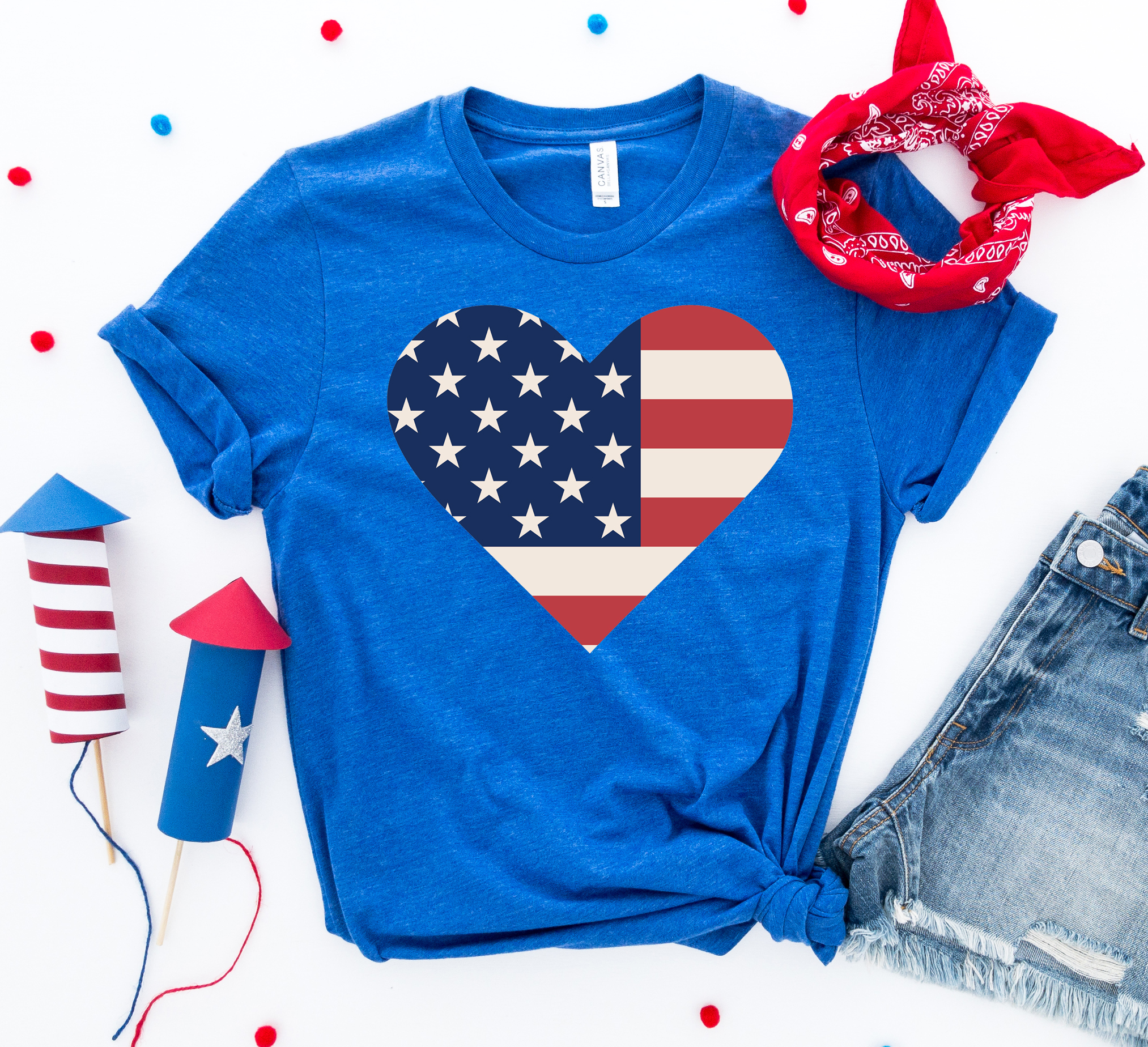USA Flag Heart T-shirt made of premium ring spun cotton with a vibrant heart-shaped flag design.