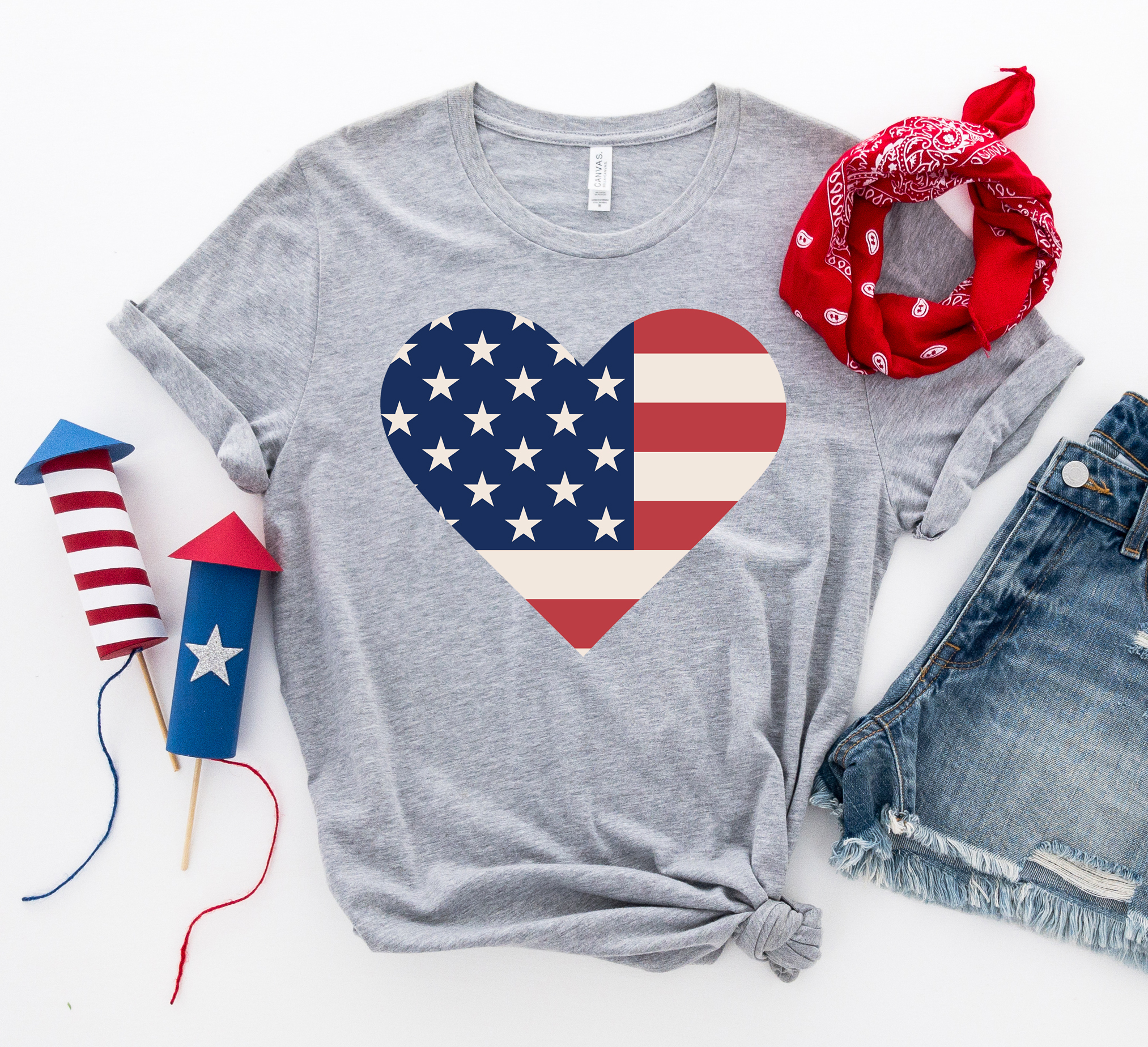 USA Flag Heart T-shirt made of premium ring spun cotton with a vibrant heart-shaped flag design.