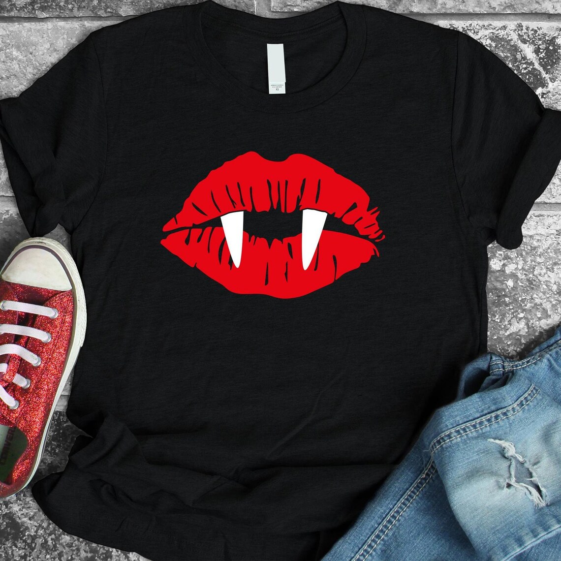 Vampire Lips Halloween T-shirt featuring a striking design on premium cotton fabric, perfect for Halloween festivities.