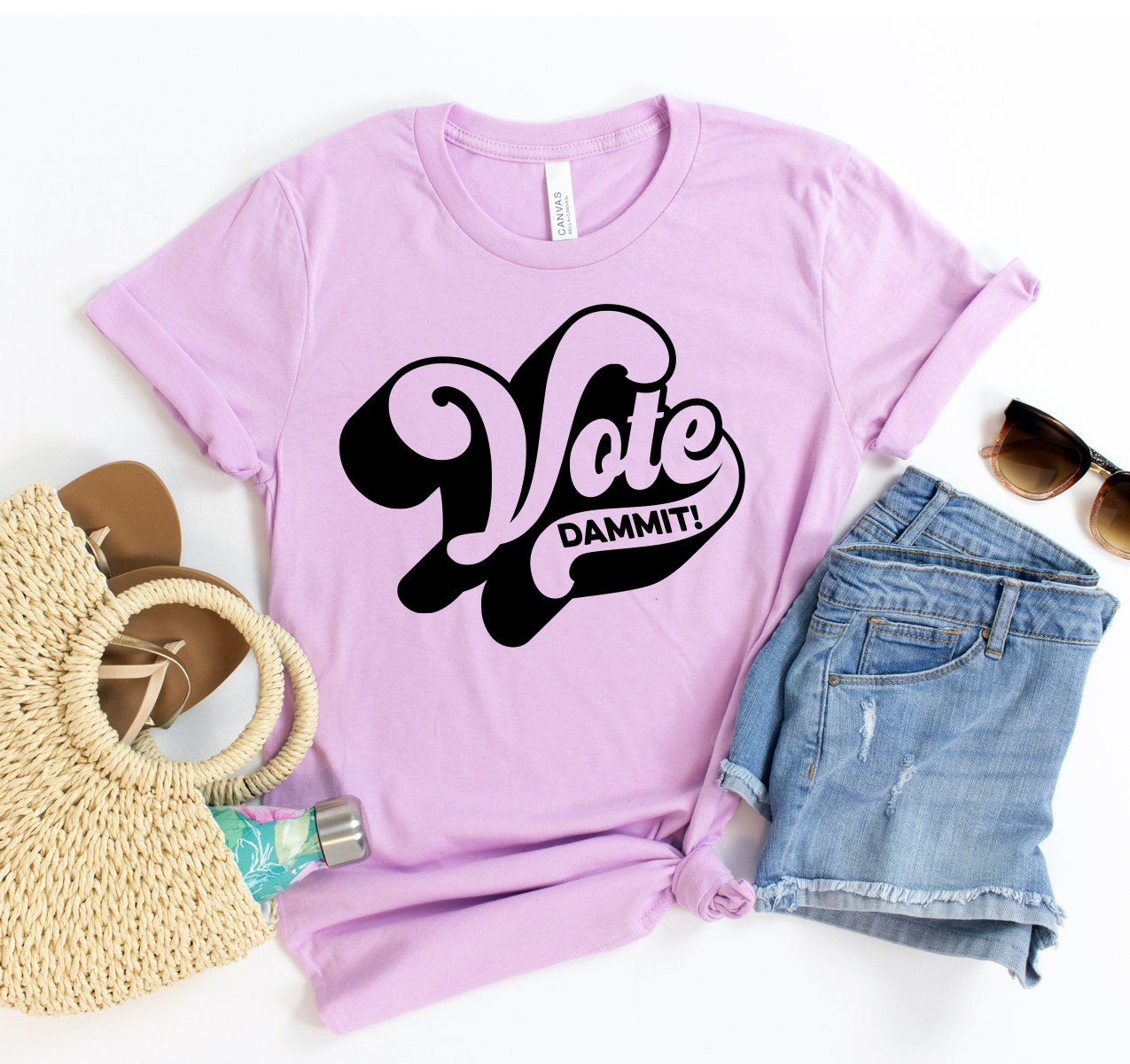 Vote Dammit T-shirt displayed on a mannequin, showcasing its classic unisex design and soft fabric.