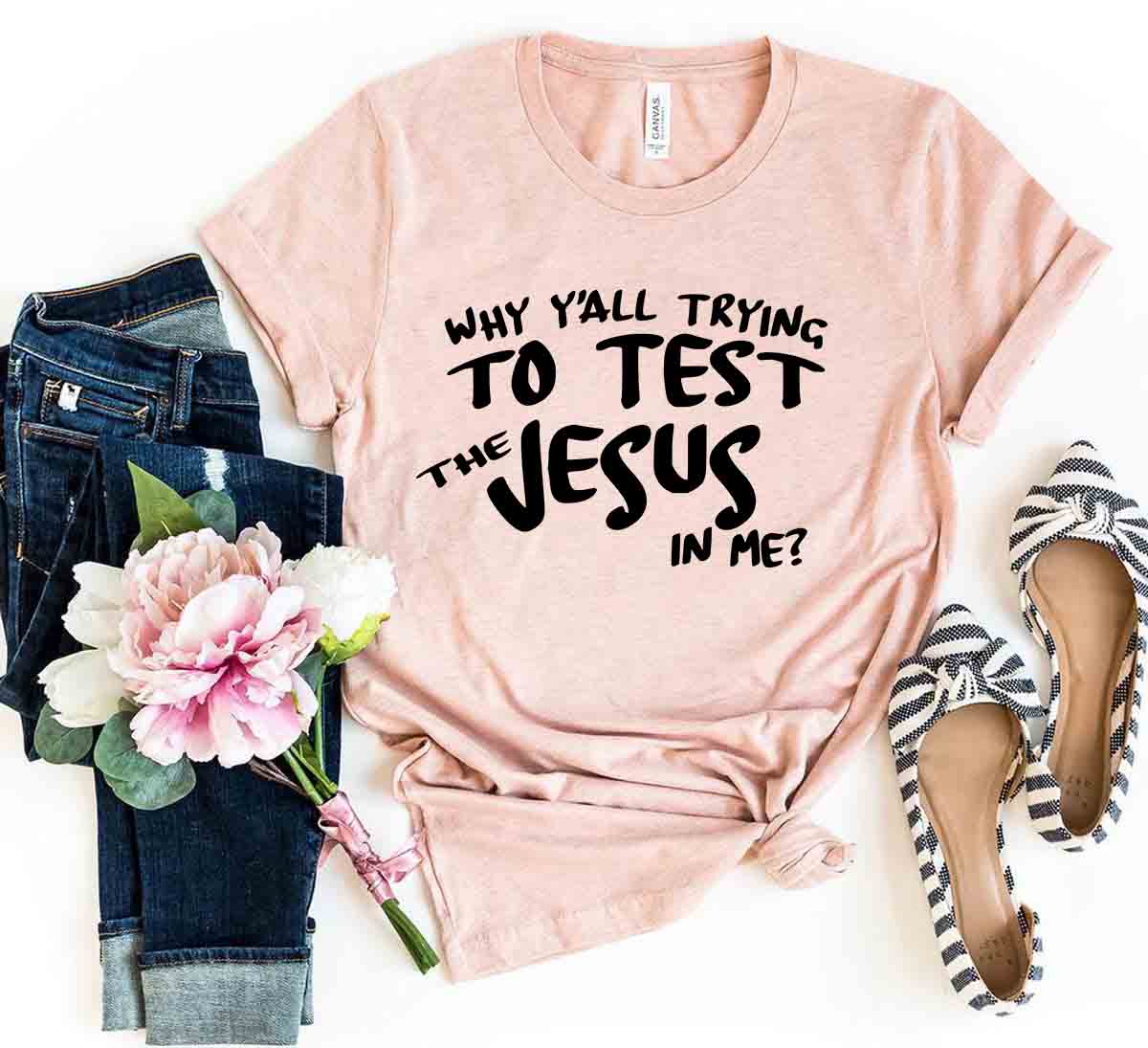 Unisex T-shirt featuring the phrase 'Why All Are Trying To Test Jesus In Me' in bold print, made from soft ring spun cotton, available in various colors.