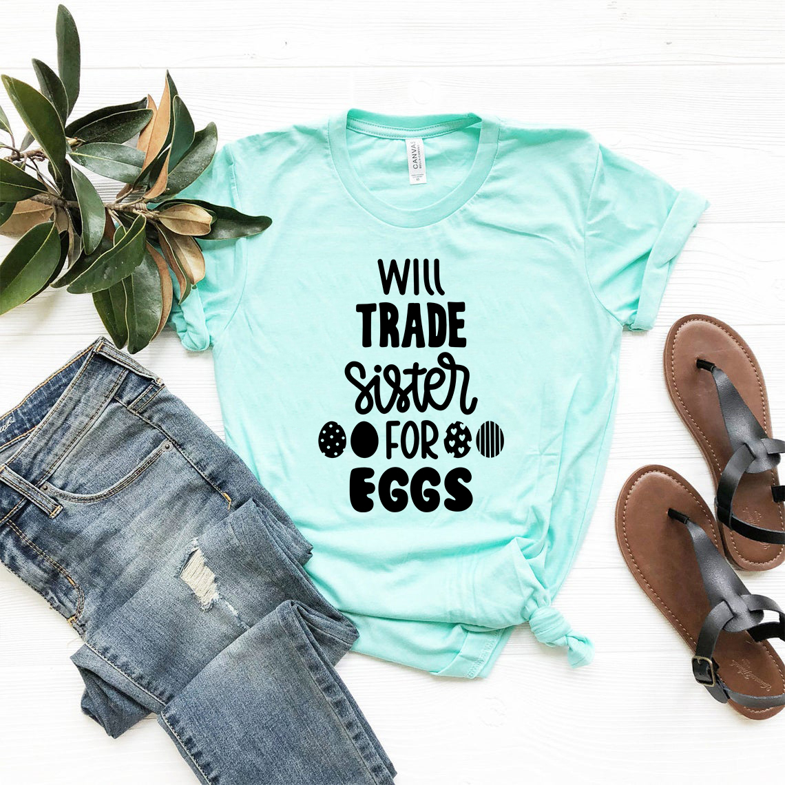 A humorous unisex T-shirt featuring the slogan 'Will Trade Sister For Eggs', made from soft ring spun cotton, available in multiple colors.