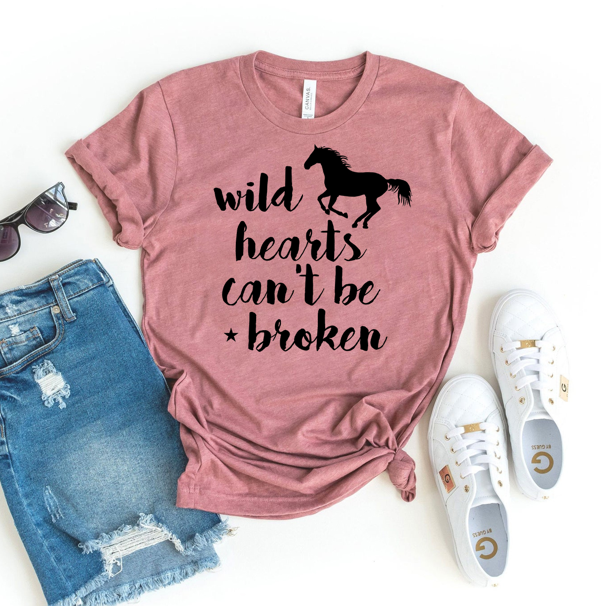 Wild Hearts Can't Be Broken T-shirt made of premium ring spun cotton, featuring a vibrant flex print design, available in various sizes.