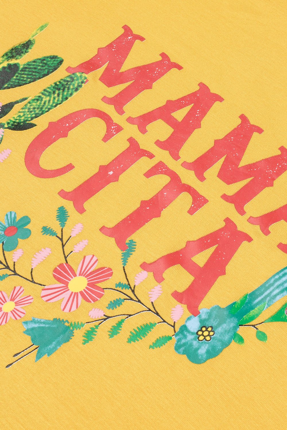 Women wearing a yellow Mamacita casual tee with cactus print, showcasing a stylish summer look.