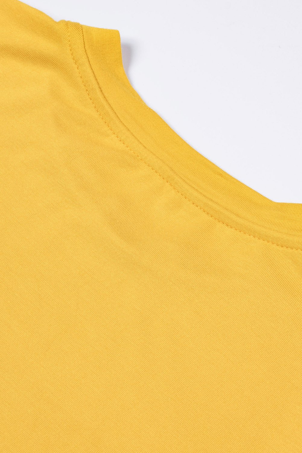 Women wearing a yellow Mamacita casual tee with cactus print, showcasing a stylish summer look.