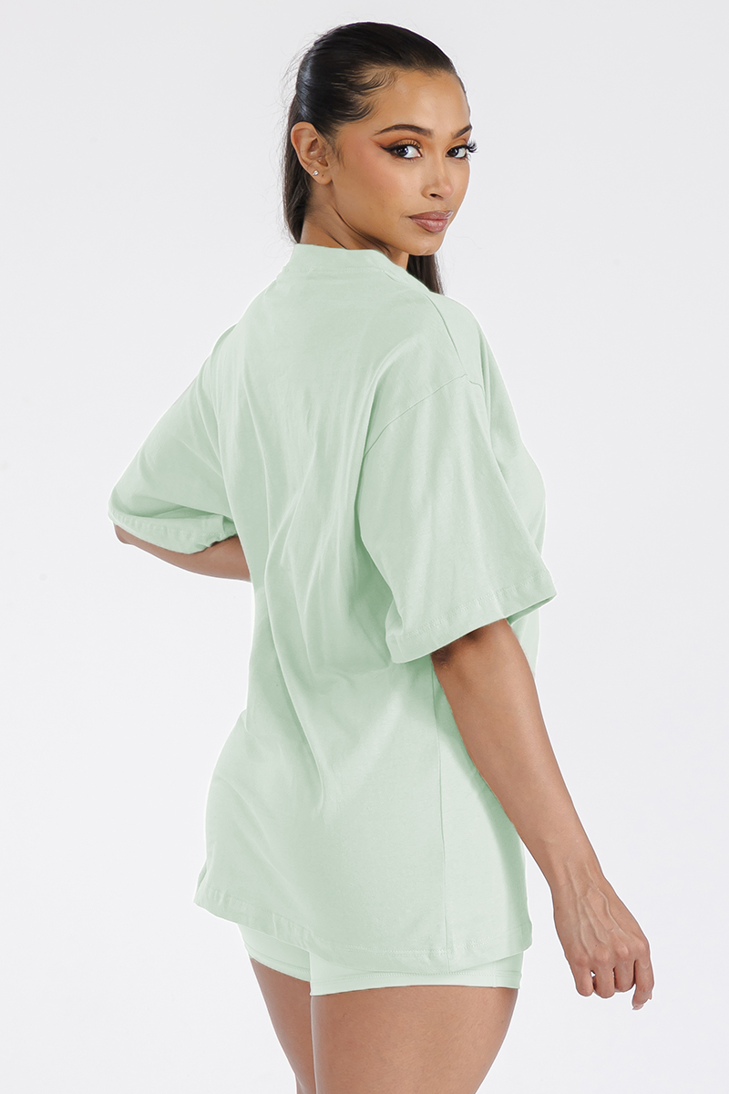 Womens Boyfriend Oversized Drop Shoulder Tee in soft cotton, showcasing its relaxed fit and round neck design.