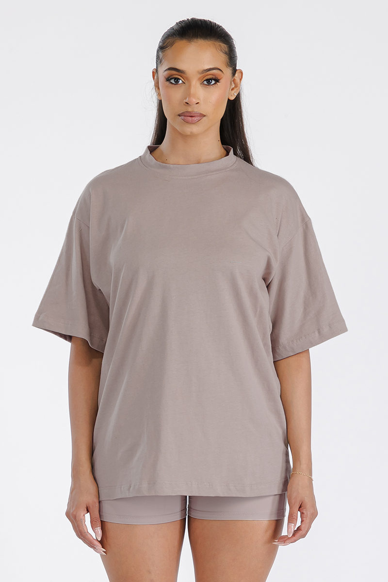 A stylish Women's Boyfriend Oversized Drop Shoulder Tee in soft cotton, featuring a round neck and relaxed fit, perfect for workouts or lounging.