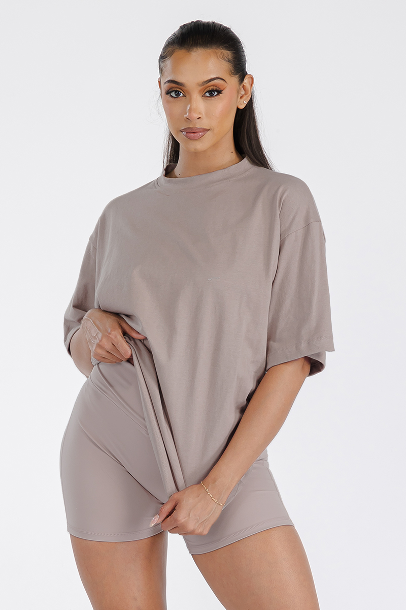A stylish Women's Boyfriend Oversized Drop Shoulder Tee in soft cotton, featuring a round neck and relaxed fit, perfect for workouts or lounging.