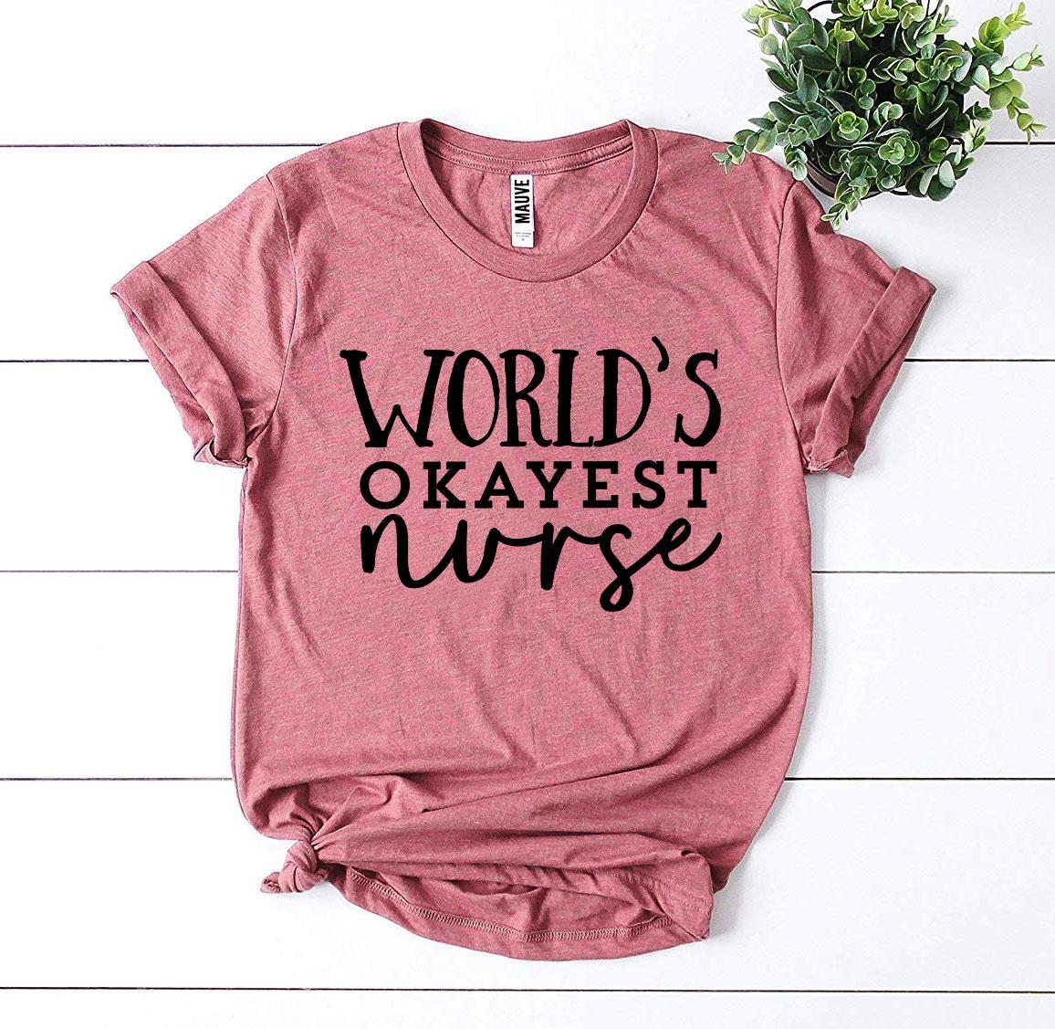 World’s Okayest Nurse T-shirt made of premium ring spun cotton with a humorous print, available in various sizes.