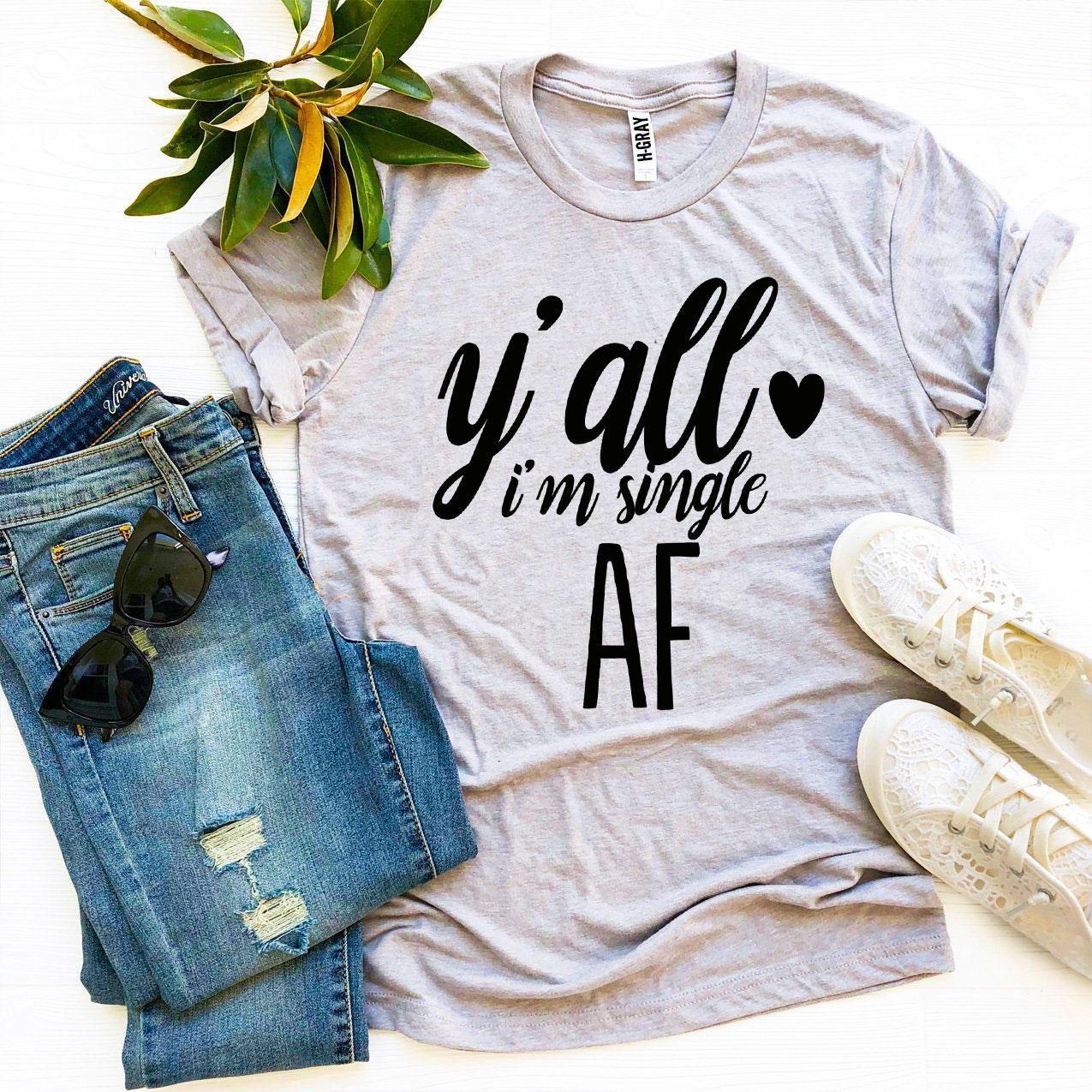 Y’all I’m Single AF T-shirt in premium ring spun cotton, featuring a bold print and comfortable fit, available in various sizes.