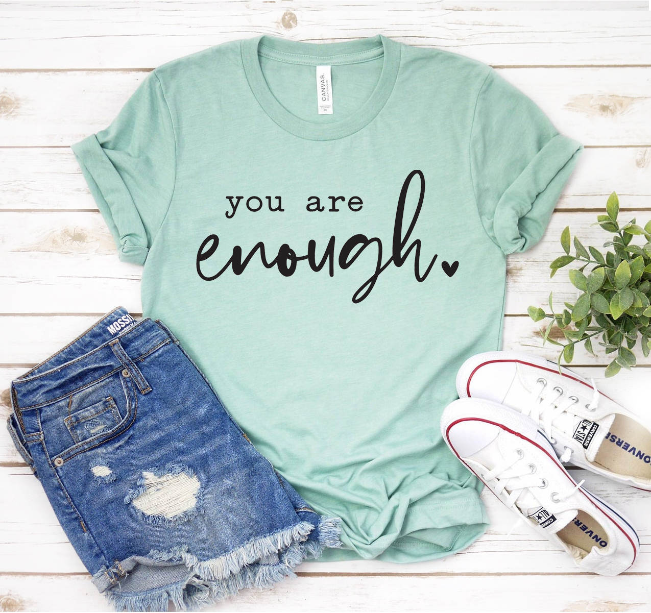 You Are Enough T-shirt displayed on a hanger, showcasing its soft fabric and unisex design.