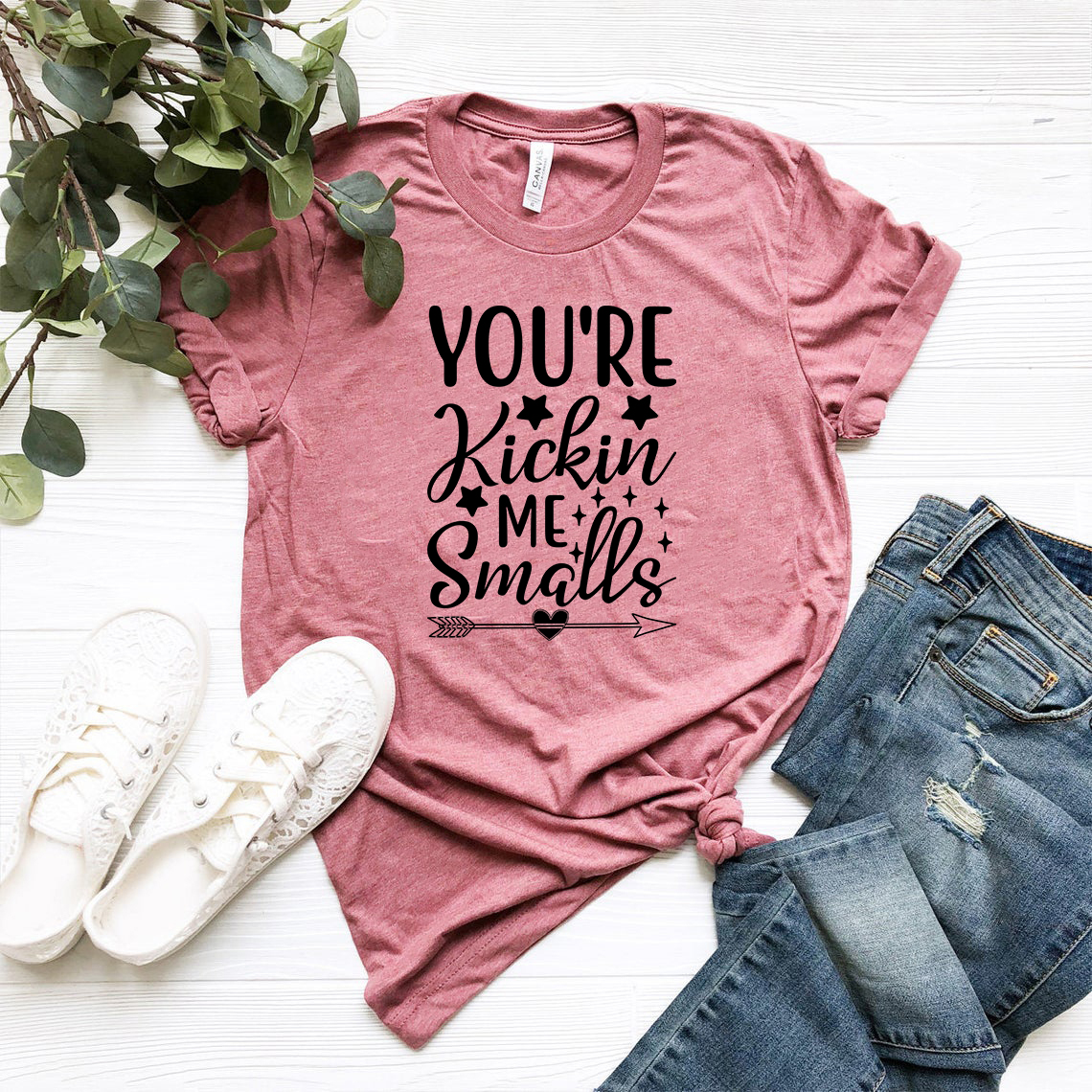 You are Kickin Me Smalls Shirt in various colors, showcasing its soft fabric and stylish design.