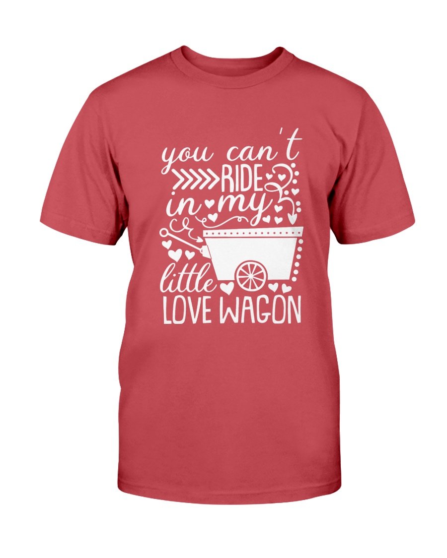 A unisex T-shirt featuring the phrase 'You Can't Ride In My Little Love Wagon' in a stylish font, made from soft ring spun cotton, available in various colors.