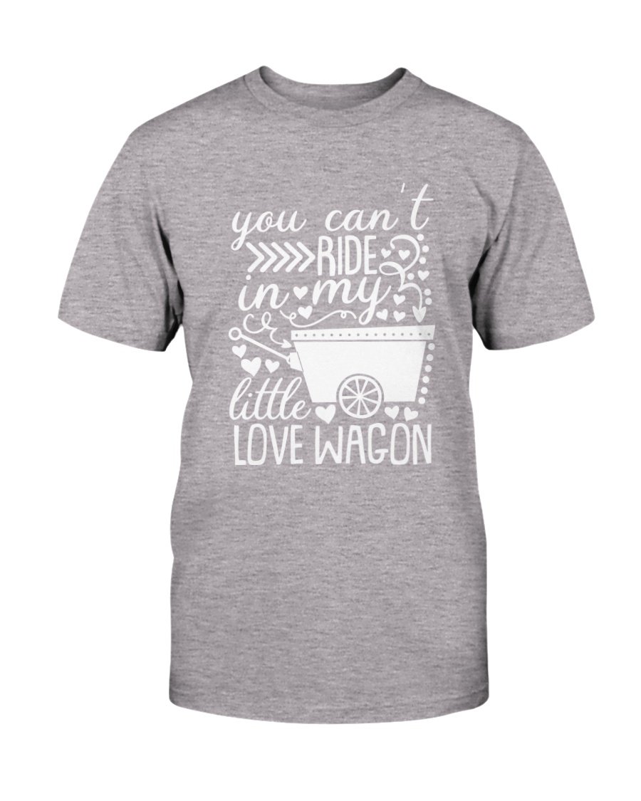 A unisex T-shirt featuring the phrase 'You Can't Ride In My Little Love Wagon' in a stylish font, made from soft ring spun cotton, available in various colors.