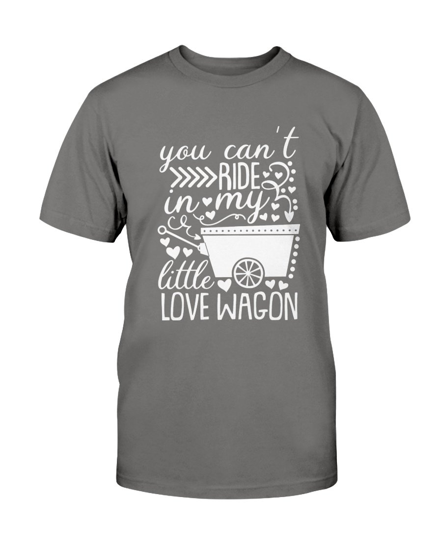 A unisex T-shirt featuring the phrase 'You Can't Ride In My Little Love Wagon' in a stylish font, made from soft ring spun cotton, available in various colors.