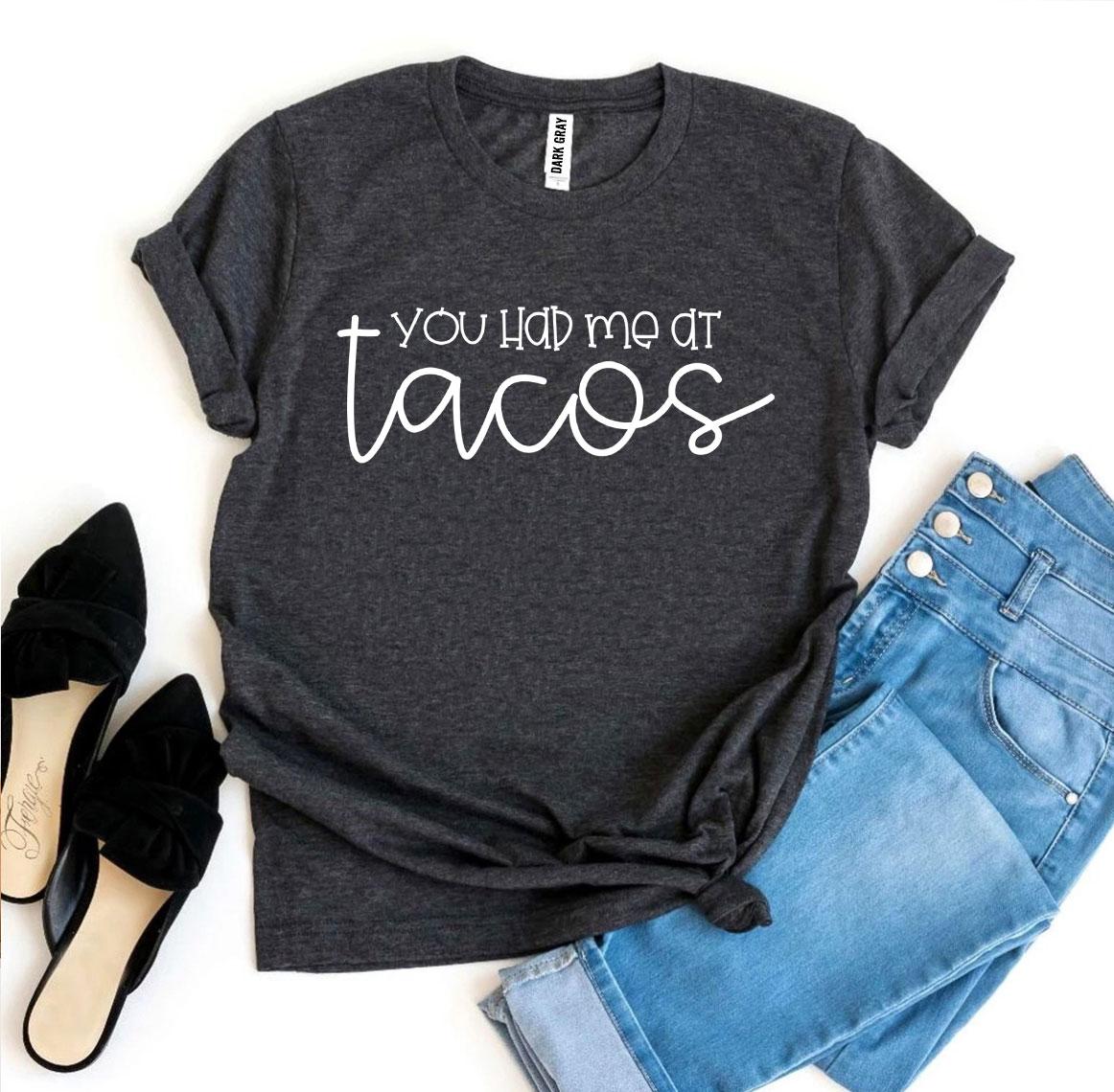 A stylish 'You Had Me At Tacos' T-shirt made from premium ring spun cotton, featuring a vibrant taco-themed print.