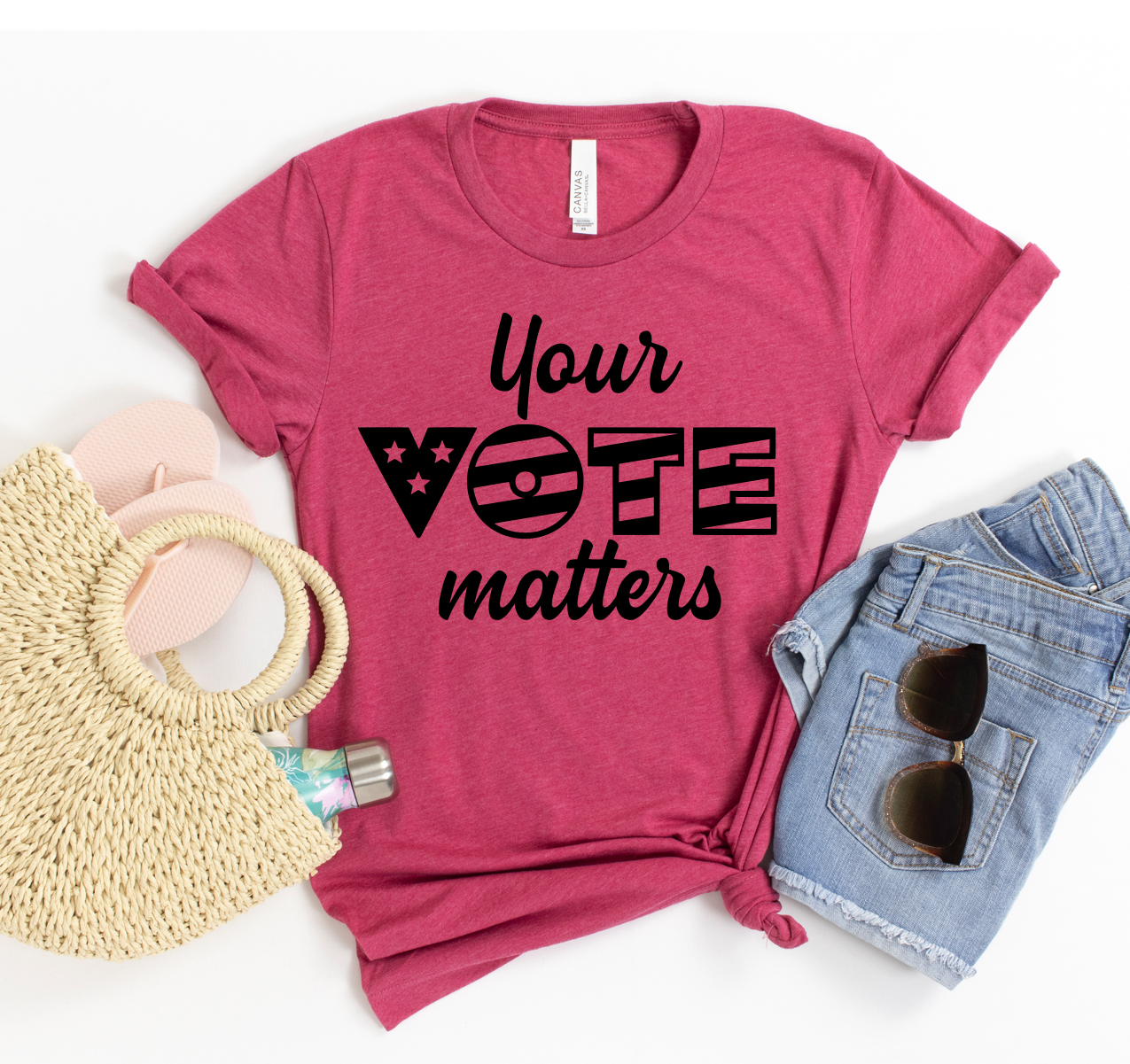 A unisex Your Vote Matters T-shirt in various sizes, showcasing its soft fabric and classic design.