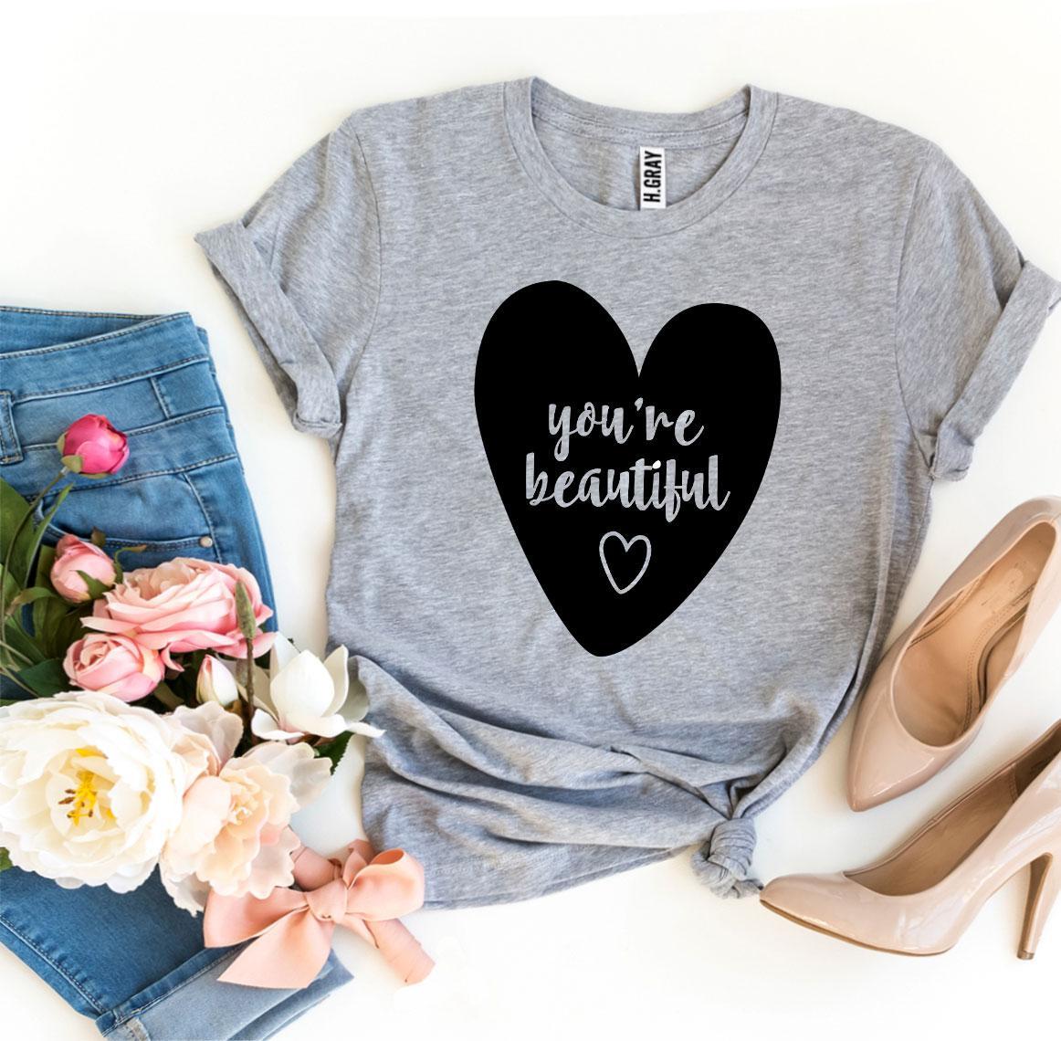You’re Beautiful T-shirt made of premium ring spun cotton, featuring a vibrant flex print design, available in various sizes.