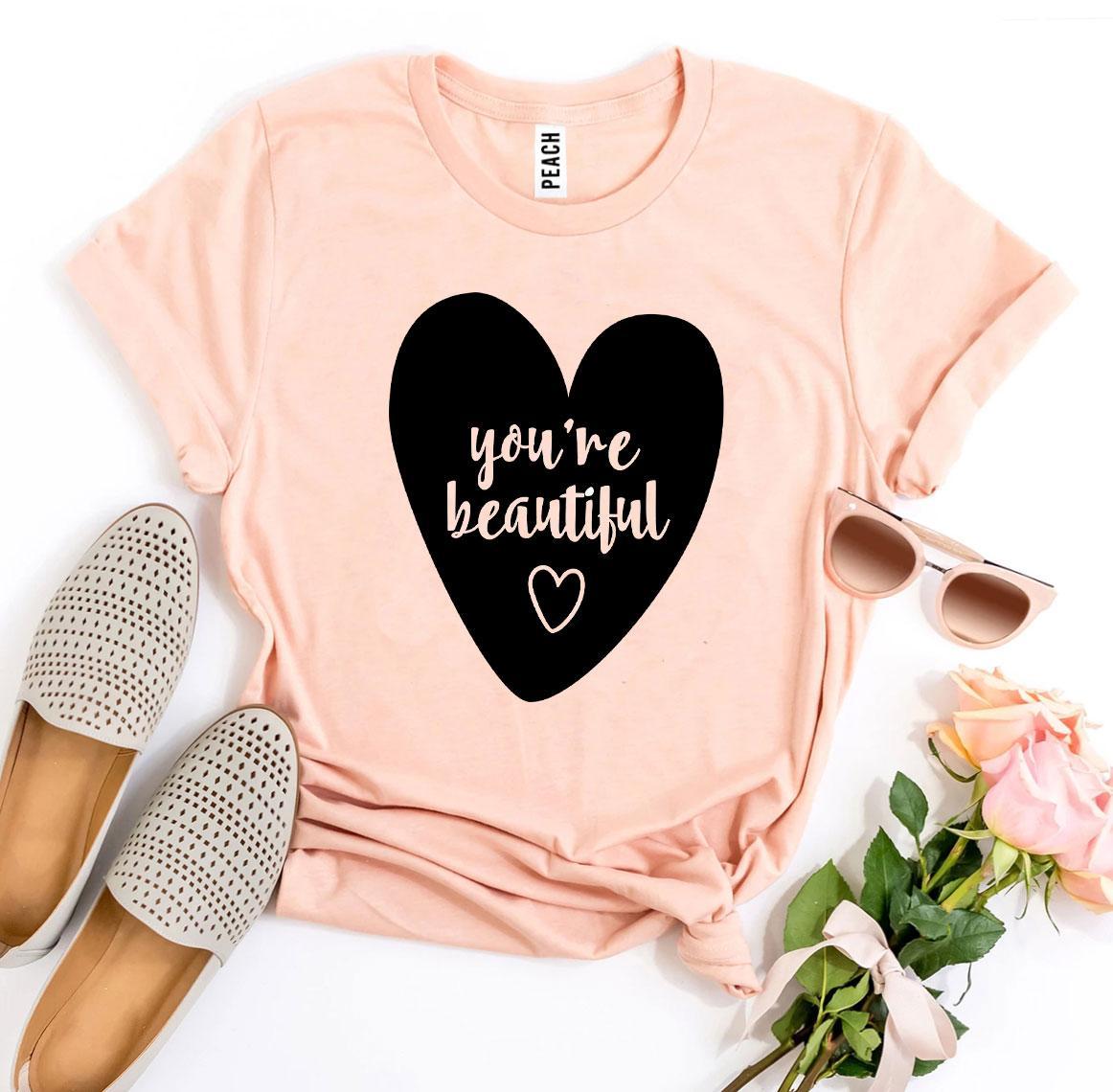 You’re Beautiful T-shirt made of premium ring spun cotton, featuring a vibrant flex print design, available in various sizes.
