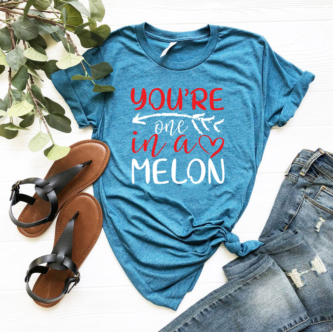 You're One In A Melon Shirt displayed in various colors, showcasing its soft fabric and stylish design.