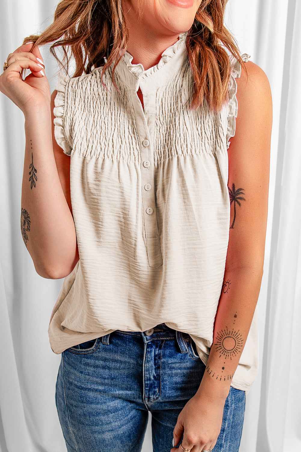 Casual apricot frilled buttons tank top with elegant mock neck and button closure, showcasing a flowy silhouette.