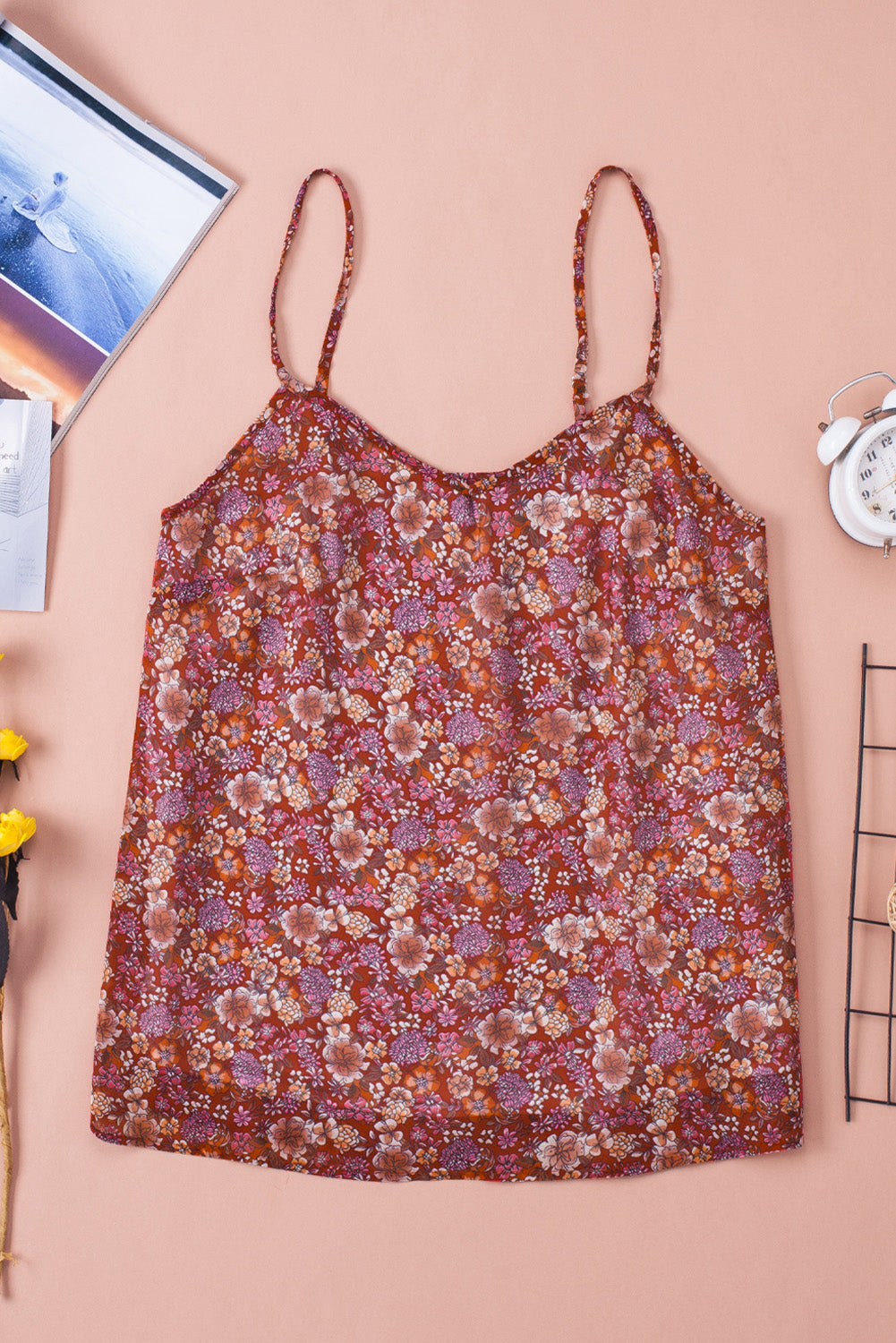 A stylish red floral print cami top with spaghetti straps, showcasing a vibrant floral pattern, perfect for summer wear.