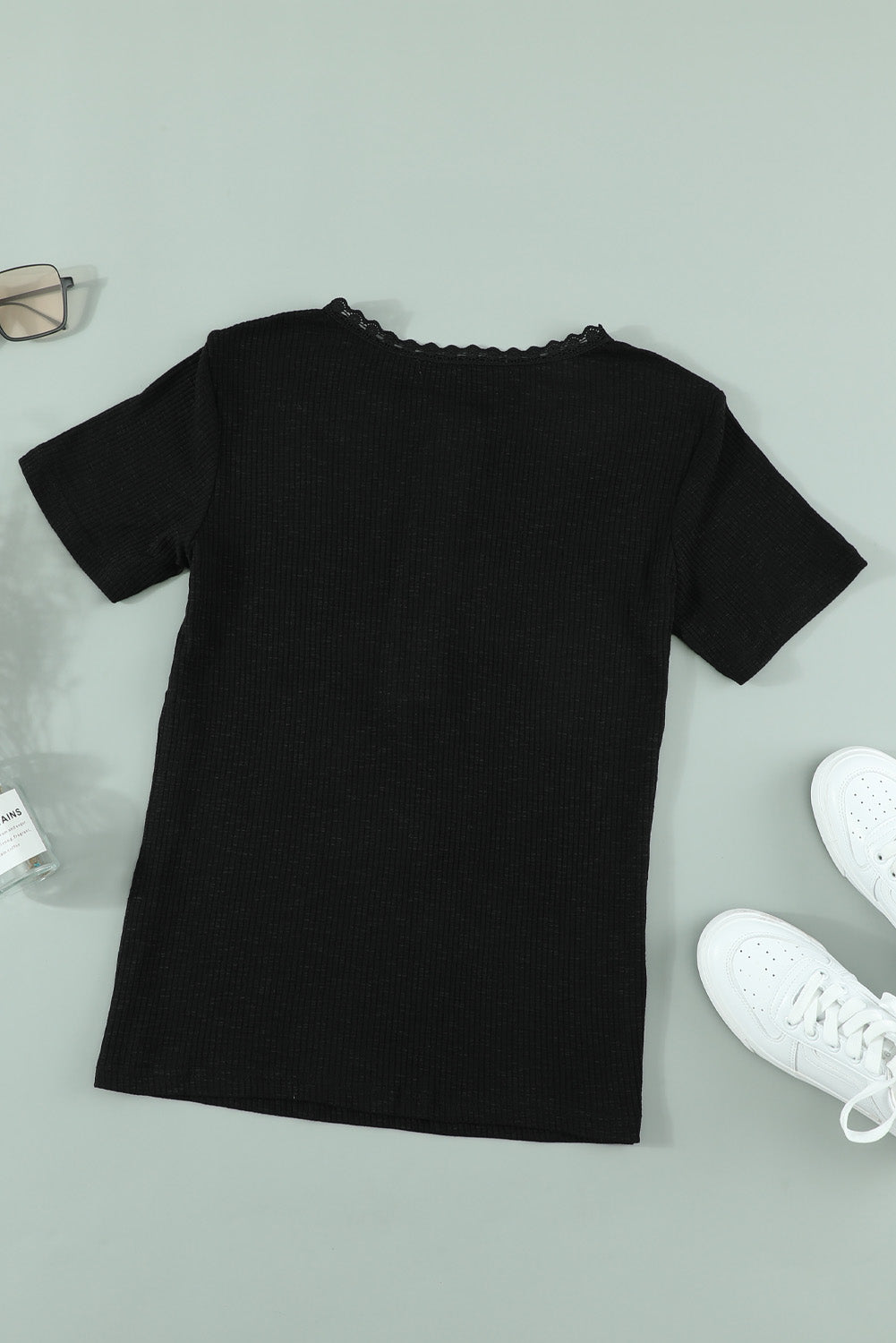 Black Crew Neck Buttoned Ribbed Knit Short Sleeve Top, featuring a stylish design with buttons and ribbed texture, perfect for summer wear.