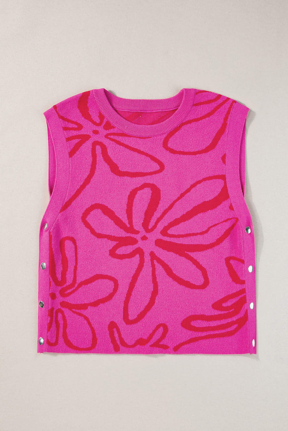 Bright Pink Button Sides Sleeveless Floral Knitted Top showcasing vibrant color and stylish button detailing.