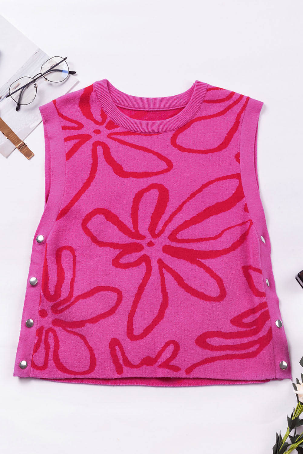 Bright Pink Button Sides Sleeveless Floral Knitted Top showcasing vibrant color and stylish button detailing.