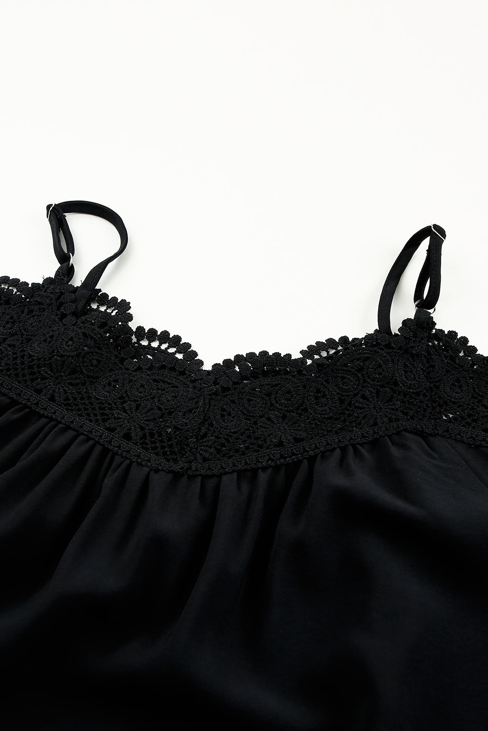 A stylish black Crochet Neckline Off-shoulder Top featuring 3-D floral details, perfect for summer outings.