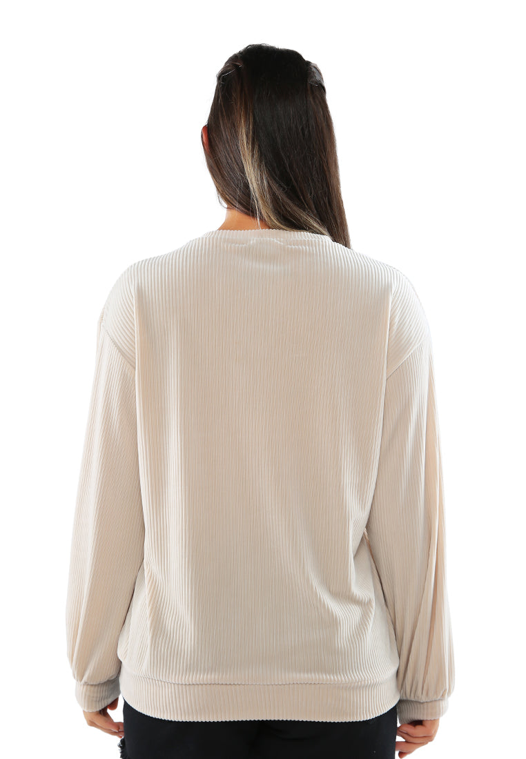 A cozy drop shoulder corduroy top featuring full sleeves and a relaxed fit, perfect for loungewear.