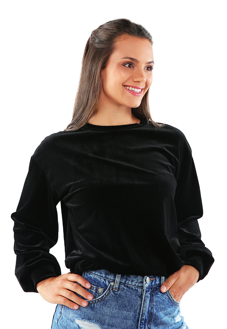 A cozy drop shoulder corduroy top featuring full sleeves and a relaxed fit, perfect for loungewear.