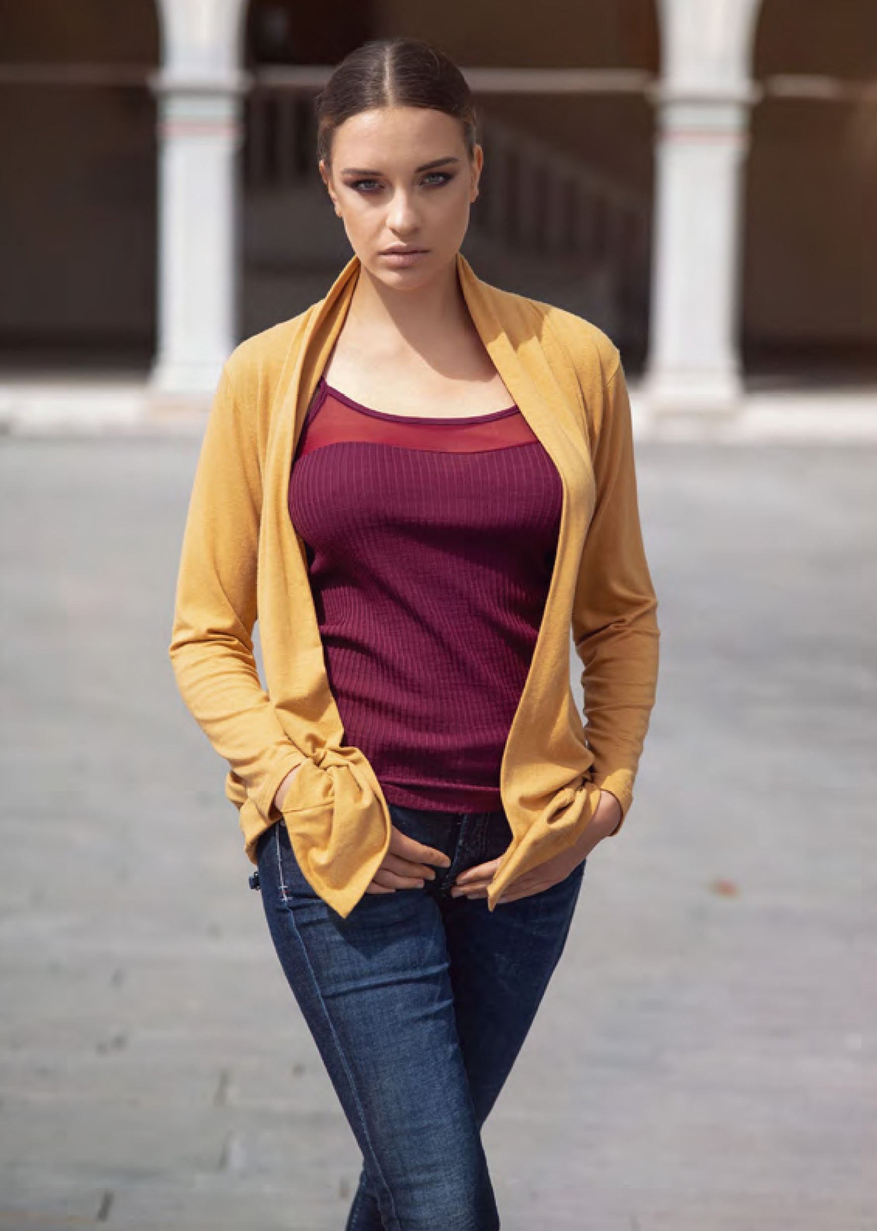 EGI Exclusive Merino Wool Blend Sleeveless Cami featuring tulle detailing, showcasing its luxurious fabric and stylish design.