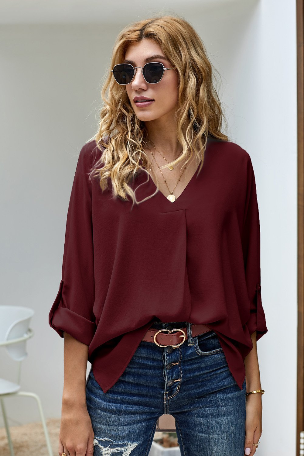 Elegant Wine V Neck Blouse with 3/4 sleeves and high-low hem, showcasing a stylish design in a rich wine color.