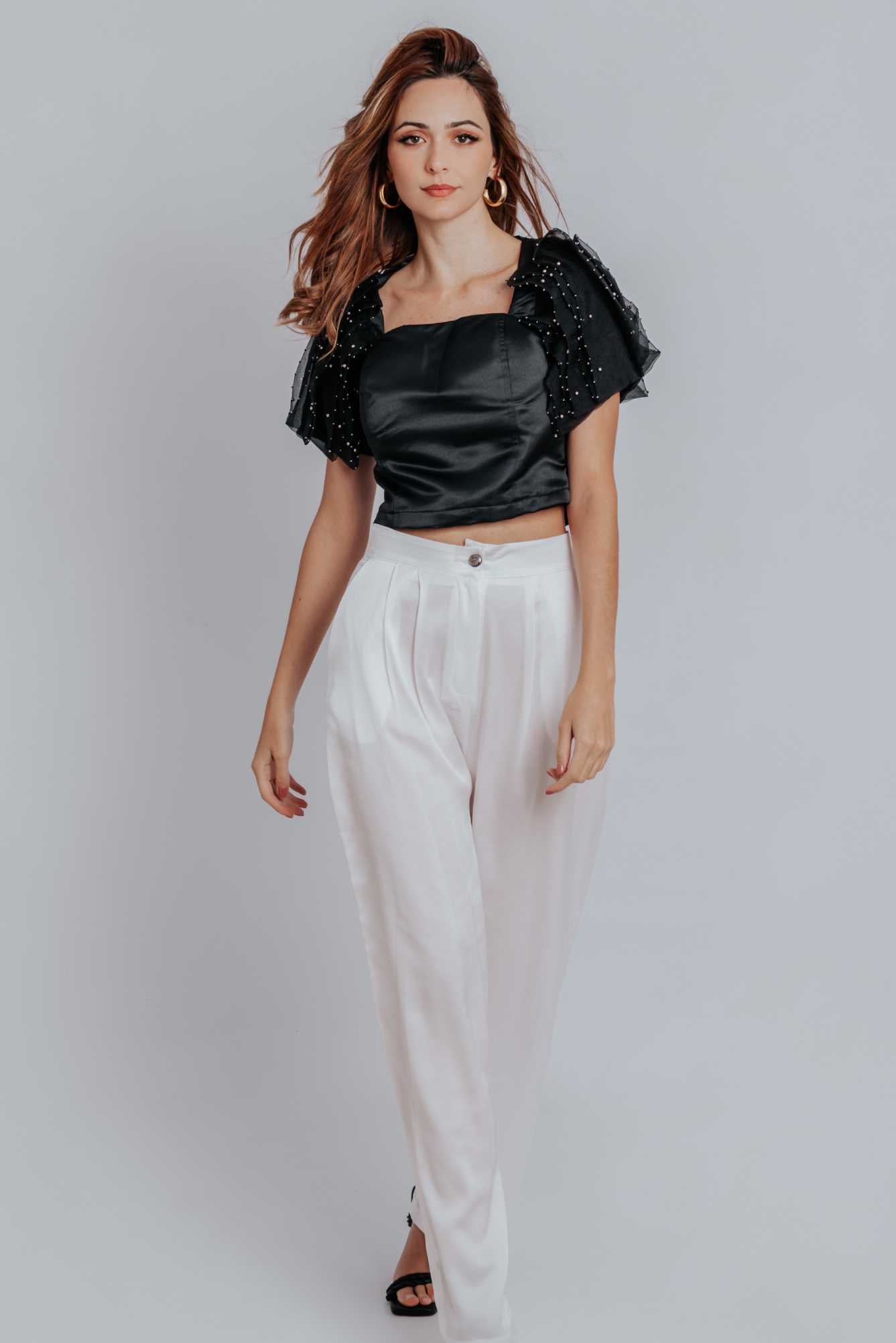 Fiona Ruffle Puff Pleated Sleeves Top featuring elegant ruffle sleeves and detailed embroidery, styled with open toe heels.