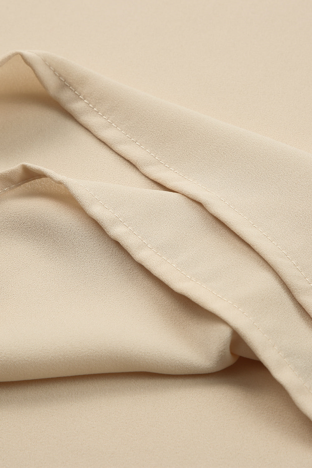 Leopard Mesh Split Neck Blouse featuring bubble bishop sleeves and elegant design, perfect for casual and formal occasions.