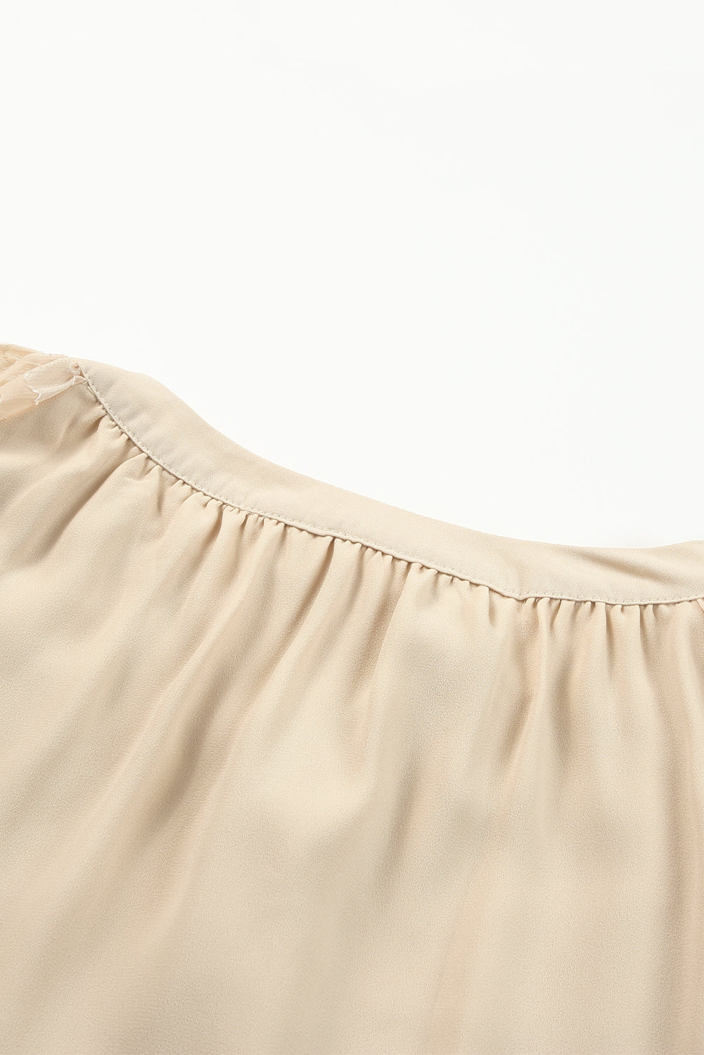 Leopard Mesh Split Neck Blouse featuring bubble bishop sleeves and elegant design, perfect for casual and formal occasions.