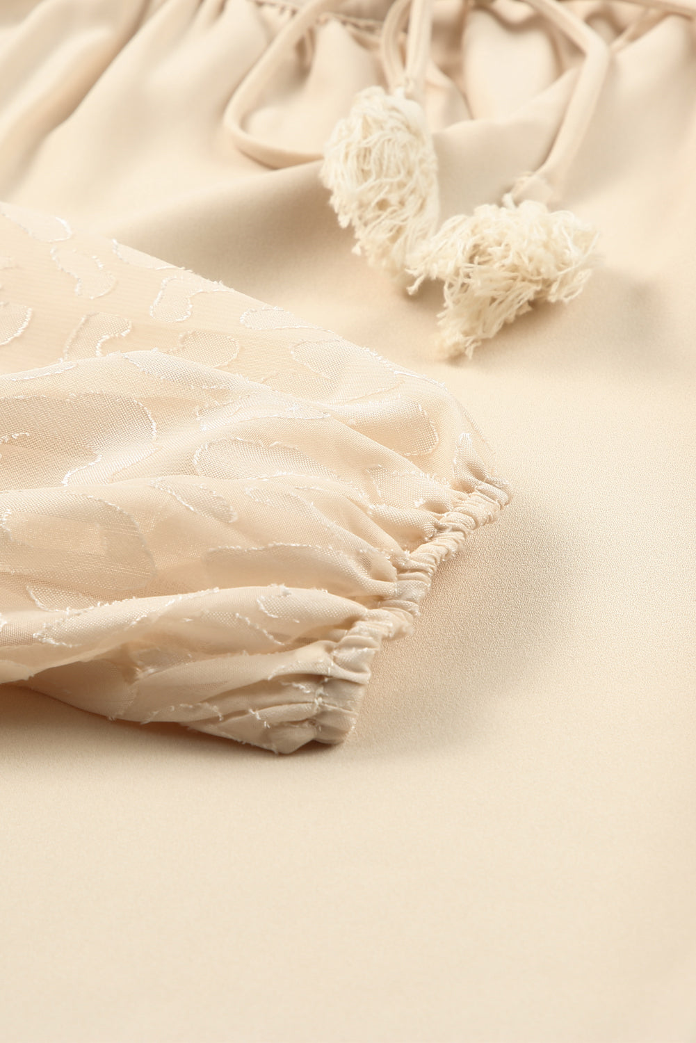 Leopard Mesh Split Neck Blouse featuring bubble bishop sleeves and elegant design, perfect for casual and formal occasions.