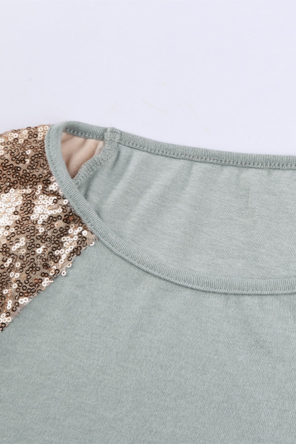 Women Gray Sequin Shoulder Long Sleeve Top featuring a classic round neck and stylish sequin details on the shoulders.