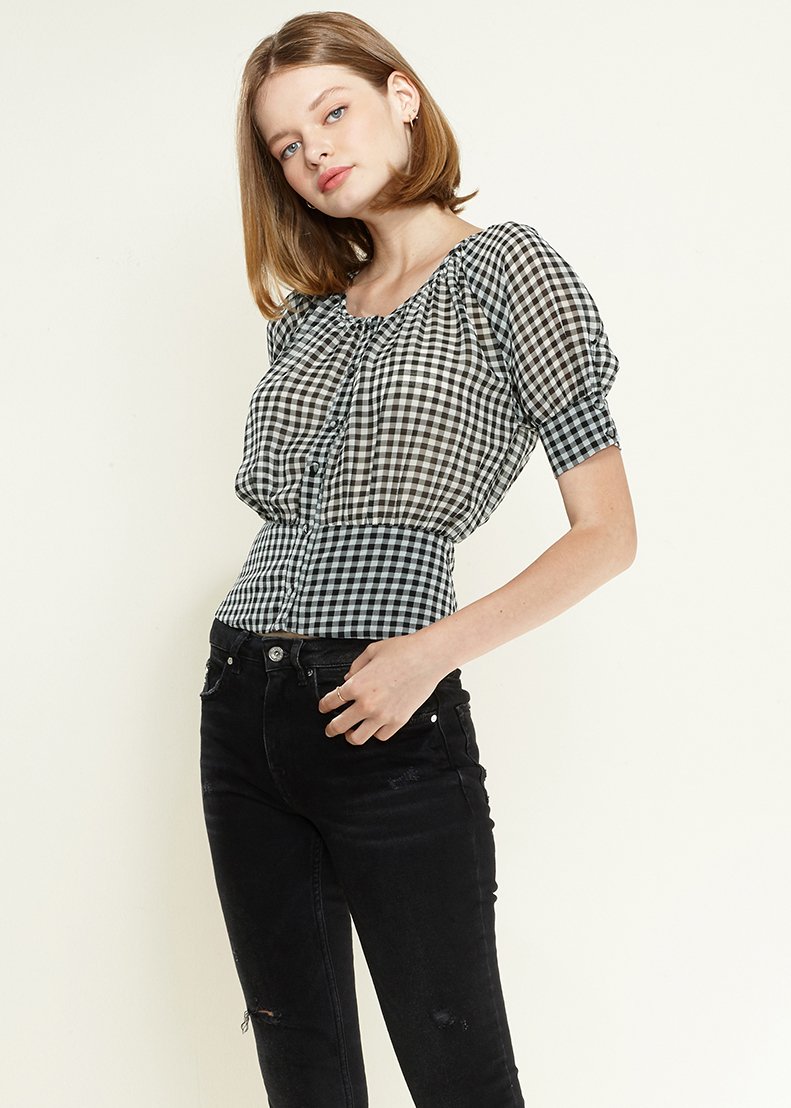 Women's black button down peplum cropped blouse with short puff sleeves and gingham pattern, showcasing a chic and sophisticated style.