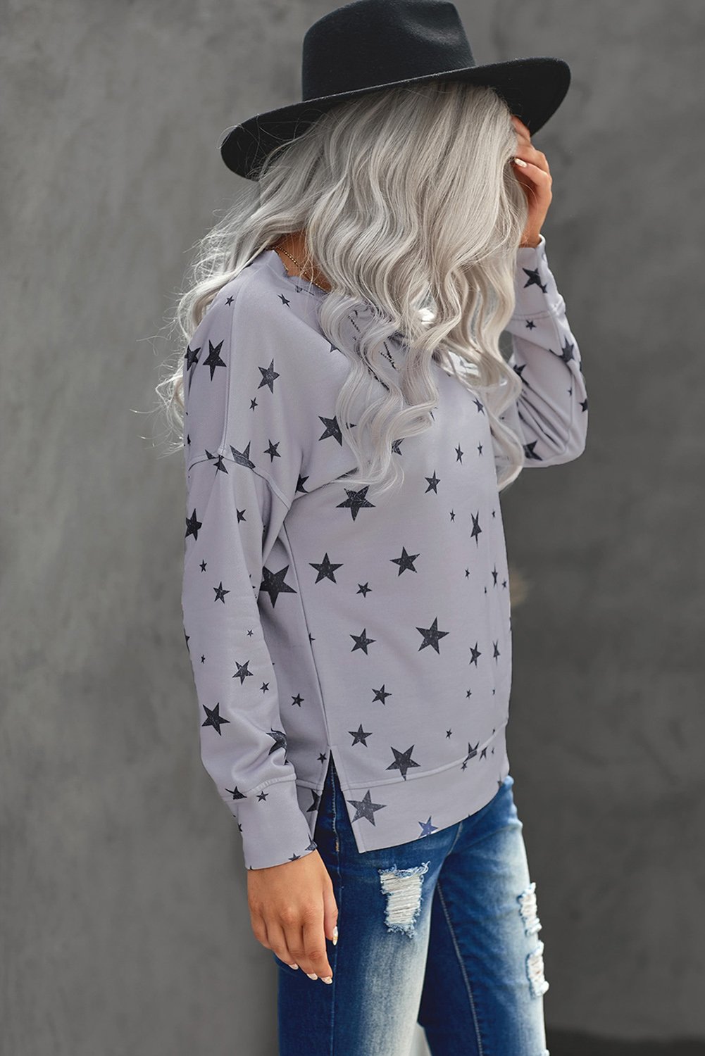 Women's gray long sleeve top featuring a stylish star print design, perfect for casual wear.